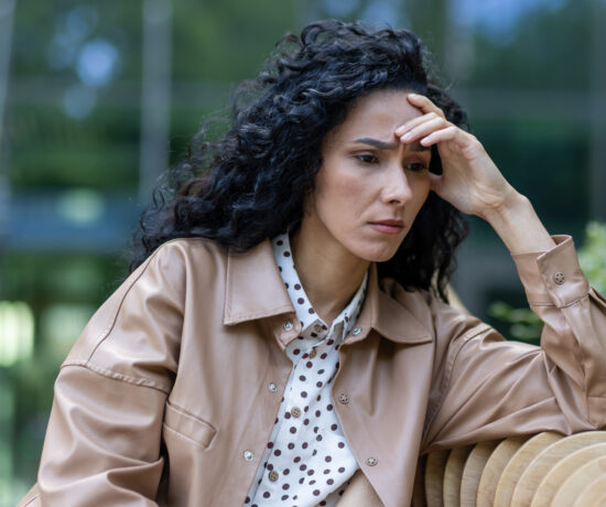 Sad woman on bench