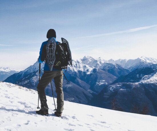 Man climbing mountain.